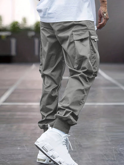 Pantaloni da jogging uomo con coulisse e tasche cargo | Diverse tasche