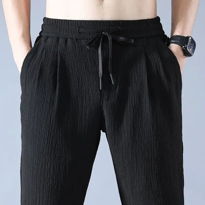 Pantaloni da uomo con coulisse in vita, taglio ampio e svasato | Quotidiani